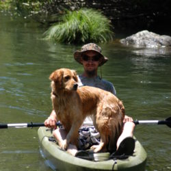 Kevin Anderson and Glimmer kayaking.