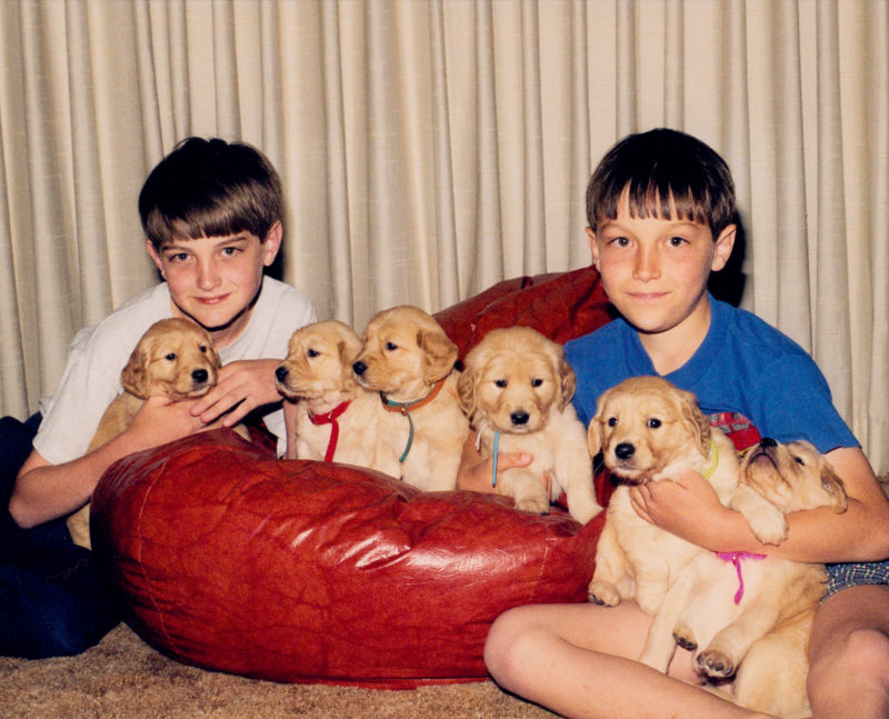 Chris and Kevin Anderson with Sky's puppies.